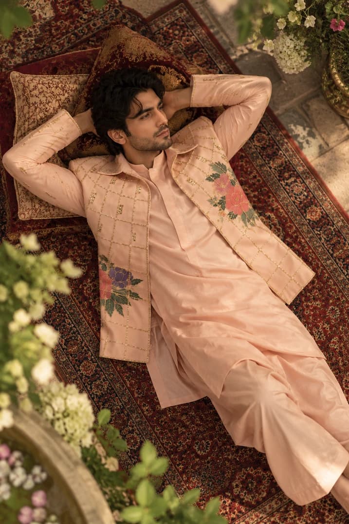 Couture silhouette adorned with royal gold accents